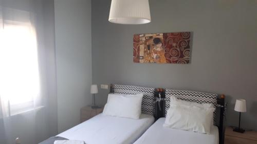 Postel nebo postele na pokoji v ubytování Villa Kallimanis