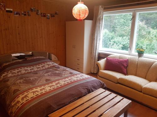 Postel nebo postele na pokoji v ubytování Pyhtää Garden Villa
