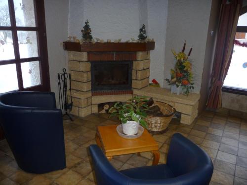 Χώρος καθιστικού στο Auberge Le Sillet