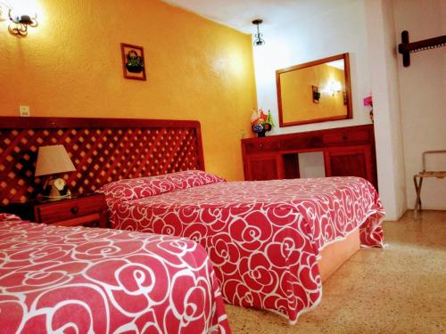 Katil atau katil-katil dalam bilik di Hotel Calendas