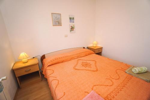 Postel nebo postele na pokoji v ubytování Apartment Sandra
