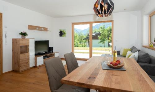 Televízia a/alebo spoločenská miestnosť v ubytovaní Ferienwohnung App. MOUNTAIN VIEW