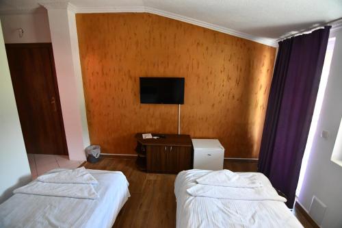 Postel nebo postele na pokoji v ubytování Apartmani Timm