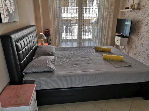 Postel nebo postele na pokoji v ubytování Brick Apartment
