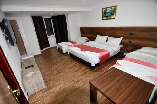 Postel nebo postele na pokoji v ubytování Apartmani Timm