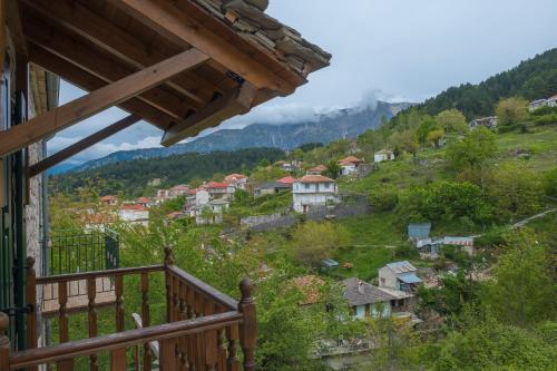 a view from the balcony of a house at Hotel Arhontiko Vourloka in Pramanta