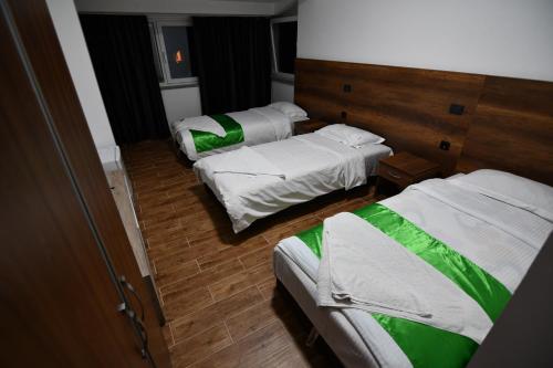 Postel nebo postele na pokoji v ubytování Apartmani Timm