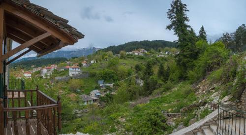 a view of a small village on a hill at Hotel Arhontiko Vourloka in Pramanta
