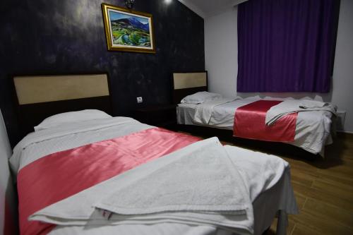 Postel nebo postele na pokoji v ubytování Apartmani Timm