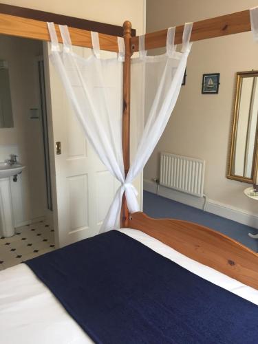 Кровать или кровати в номере Marlow Lodge
