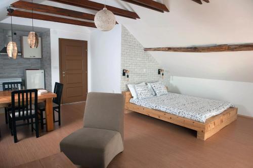 Säng eller sängar i ett rum på Villa Pavlina