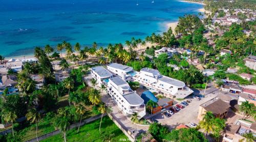 an aerial view of a resort near the beach at Puerto Plaza Las Terrenas in Las Terrenas