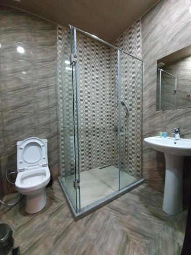 Koupelna v ubytování Hotel Soft