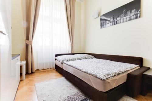Postel nebo postele na pokoji v ubytování Apartment Hálkova 5