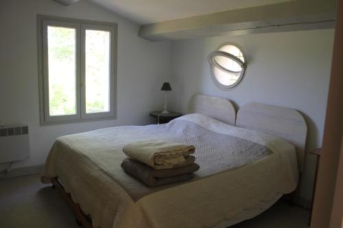 En eller flere senge i et værelse på mas bomure
