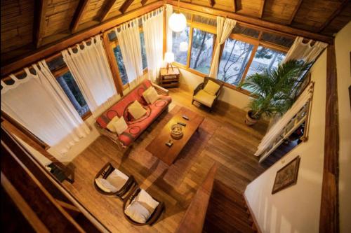 an overhead view of a living room with a couch at Coco Ne in Máncora