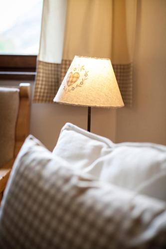 Katil atau katil-katil dalam bilik di Natur Residenz Anger Alm - Adults only