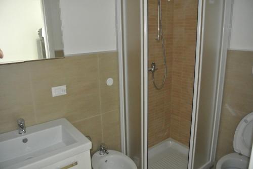 Koupelna v ubytování Condominio Shedir