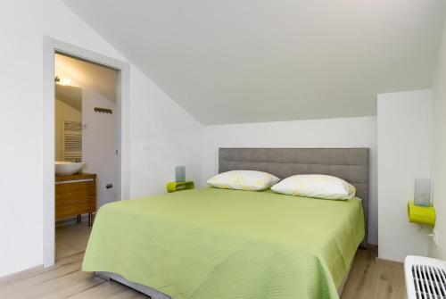 Posteľ alebo postele v izbe v ubytovaní Apartmani Bosa
