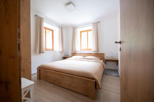 Postel nebo postele na pokoji v ubytování Hiša Urška