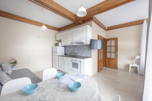 Kuchyň nebo kuchyňský kout v ubytování TópART Apartman I