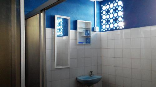 Ванная комната в Natal Casa de Playa en Pitangui‏