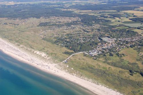 an aerial view of a beach and the ocean at Tannisby Camping in Tversted