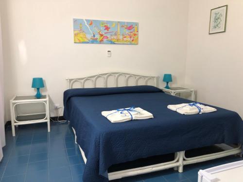 Postel nebo postele na pokoji v ubytování Villa Azzurra