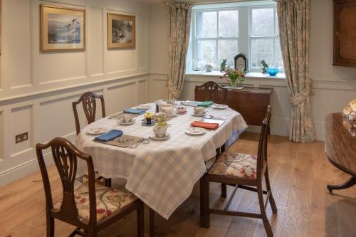 a dining room with a table and chairs at Billerwell B&B in Hawick