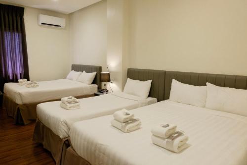Postel nebo postele na pokoji v ubytování CREVICE HOTEL