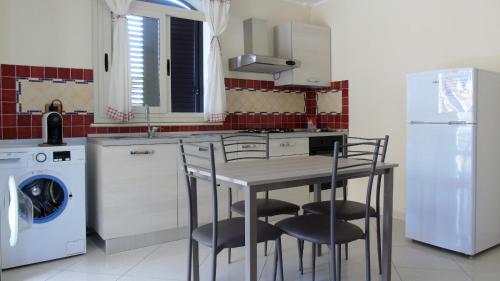 Een keuken of kitchenette bij Casa Vacanza All'Estremo Sud