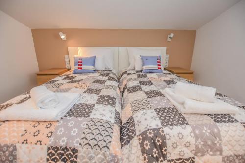 Katil atau katil-katil dalam bilik di Villa Magena - Modern Apartments in Pag Center