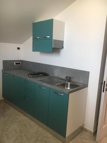 Una cocina o zona de cocina en Maison de Charme Iommella