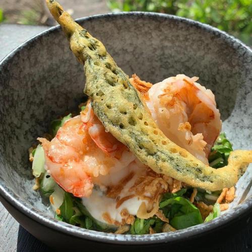 a bowl of food with shrimp and greens in it at Hotel Ernst Sillem Hoeve in Den Dolder