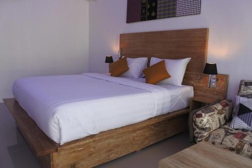 Cama o camas de una habitación en HI5 Kuta