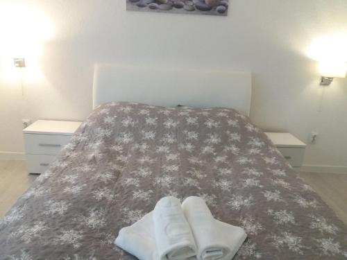 Postel nebo postele na pokoji v ubytování VISOKO COMFORT suite