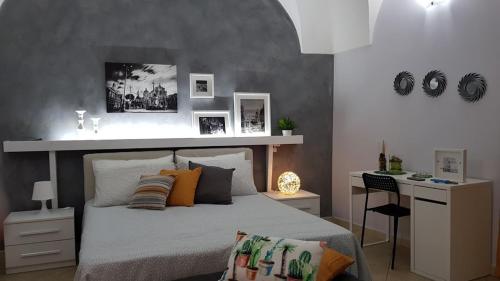 Voodi või voodid majutusasutuse Sotto il Duomo toas