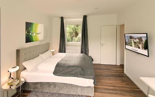 Katil atau katil-katil dalam bilik di Eco Smart Apartments Nürnberg Süd