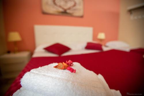 Postel nebo postele na pokoji v ubytování B&B Sicily Luxury