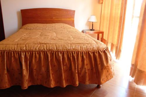 Hotel Conquistadorにあるベッド