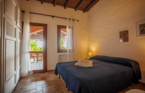 Katil atau katil-katil dalam bilik di Villa Kalè - Klodge