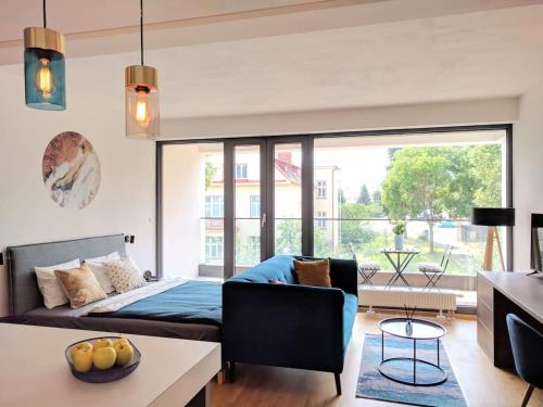 Posteľ alebo postele v izbe v ubytovaní Cosy Design Apartment IV