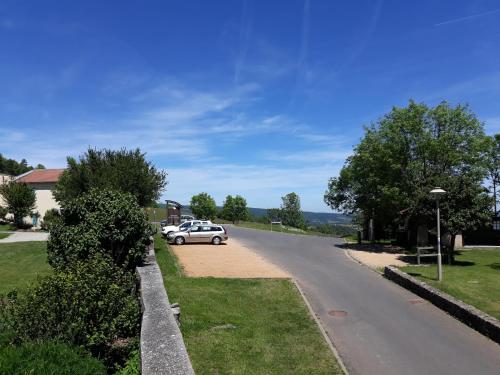 a car parked on the side of a road at Maison de la Monne in Olloix