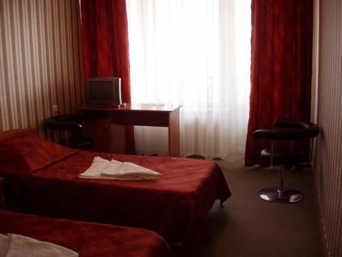 Hotel Mirniy Resortにあるベッド