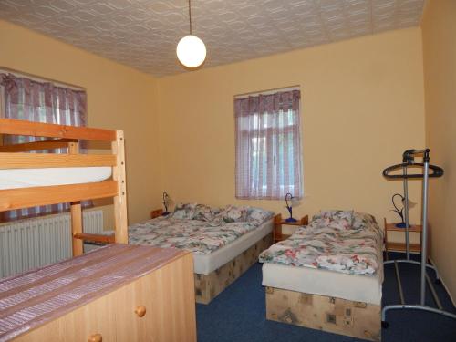 Postel nebo postele na pokoji v ubytování Prokopka