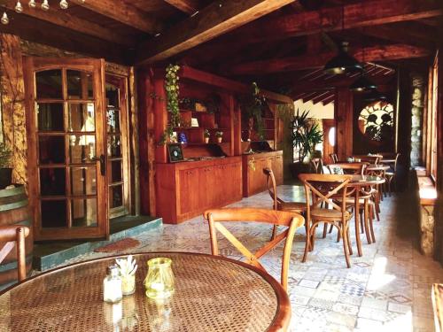 a restaurant with tables and chairs in a room at Hotel Casablanca Spa & Wine in Casablanca