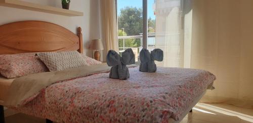 Llit o llits en una habitació de Punta Prima Pleamar