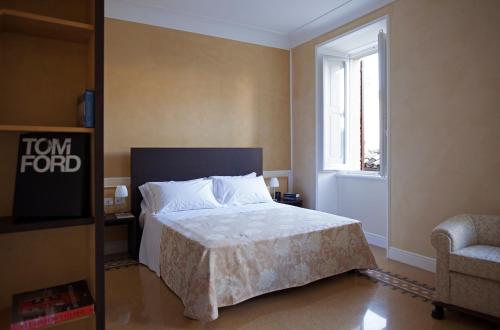 Lova arba lovos apgyvendinimo įstaigoje Relais Del Borgo Hotel & Spa 4 Stelle