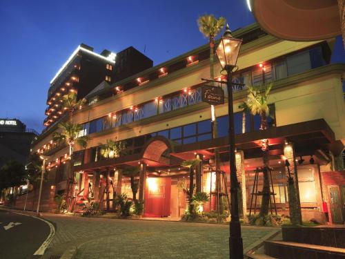 a building with a street light in front of it at Hotel Villa Kuretake in Hamamatsu