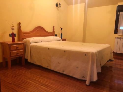 Una cama o camas en una habitación de Alojamiento Rural ELORTATXU